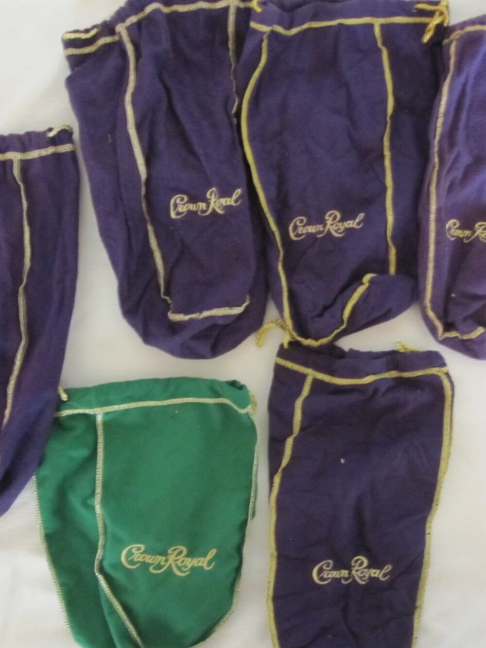 lot of 6 Crown Royal Velvet Bags, various sizes 5 purple & 1 green